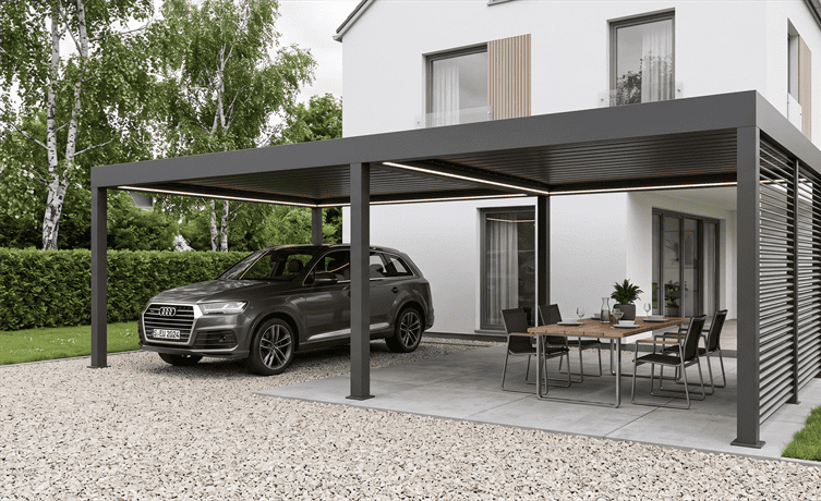 GartenLüx Pinela Carport in Anthrazit (RAL 7024) mit massivem Stahldach, integrierten LED-Streifen und Lamellenwand, gleichzeitig als Terrassenüberdachung genutzt mit Esstisch und Stühlen auf der Terrasse